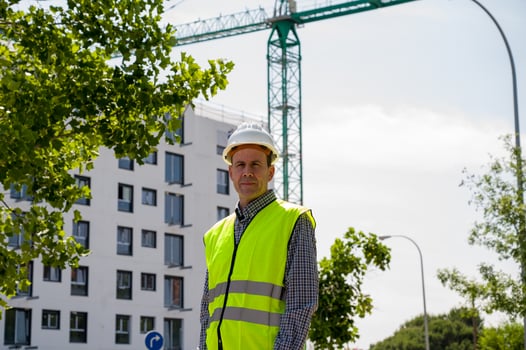 Professional young male construction worker with safety helmet and reflective vest5 photo