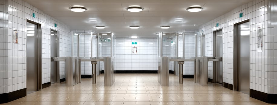 An elevator with four doors and a light photo