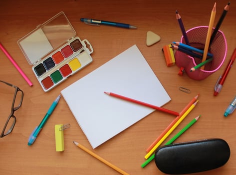 School supplies on wooden table. photo