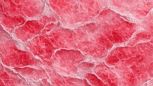 A close up of a red marble surface photo