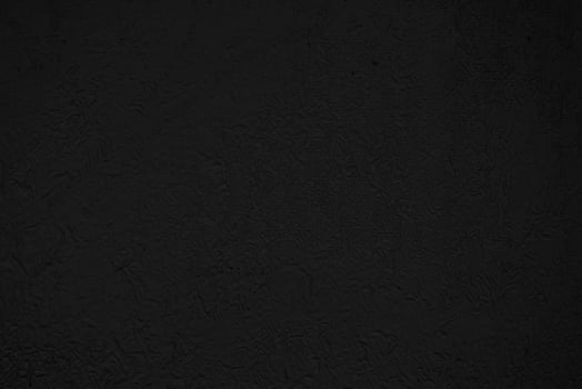 Texture of dried black paint. Abstract black background. The heavy darkness of darkness. photo