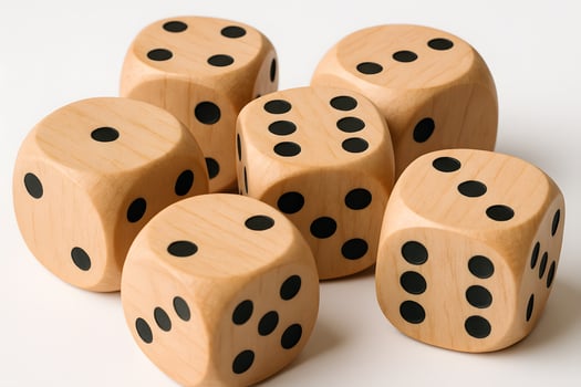 Wooden dice with black dots on them photo