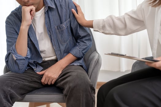 doctor encouraged. Man hold hand in front of private parts feeling discomfort and consult doctor. Venereal, testicular cancer, erectile dysfunction, premature ejaculation, prostate photo