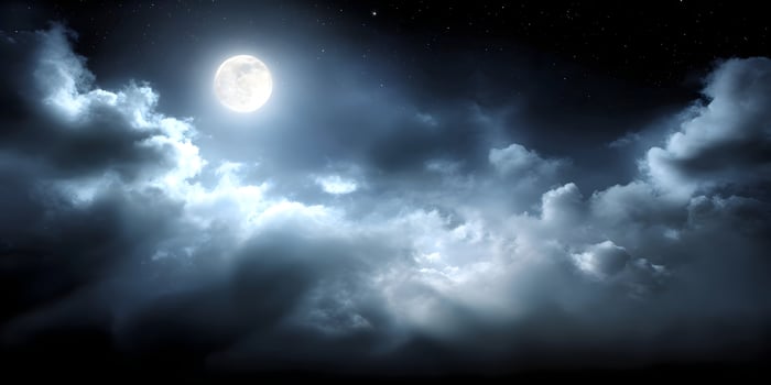 Clear View of the Moon Framed by Clouds photo