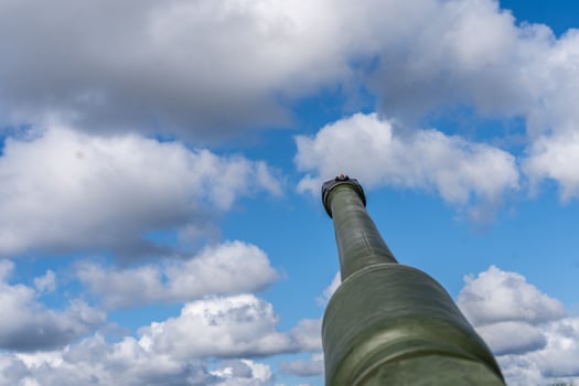 Aimed self-propelled artillery or howitzer gun photo