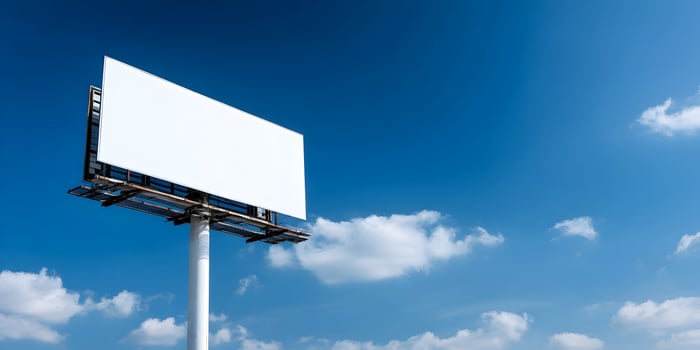 blank billboard on a blue sky background template photo