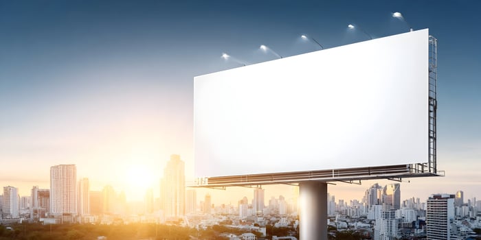 Blank Billboard Mockup Cityscape Sunrise Background photo