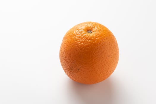 One ripe, juicy orange close-up. photo