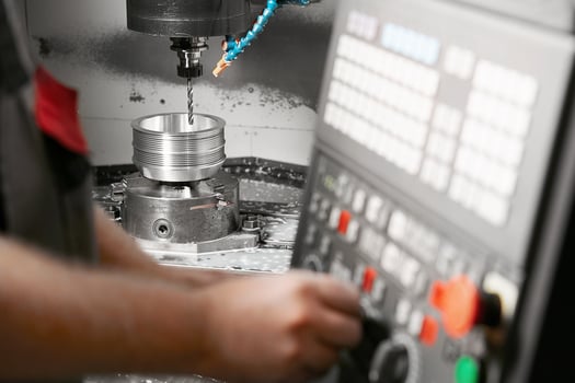 CNC milling. Numerically controlled metalworking machine makes high-precision parts. photo