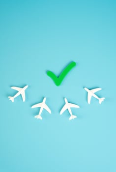 Airplanes and the permission tick. Lifting emergency measures and permission to fly. Recovery in aviation, post-pandemic normalization, or relaxation of travel restrictions. photo