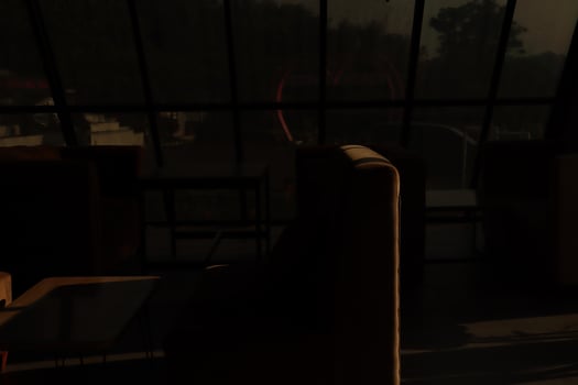 A room with a couch and a table photo