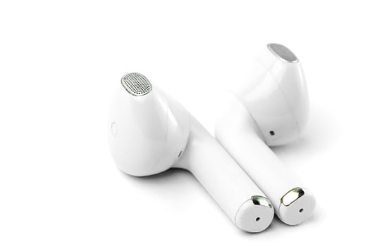 Sleek white wireless earbuds with ergonomic design and superior sound. Lightweight and compact, ideal for music, calls, gaming, and workouts with noise isolation technology. photo