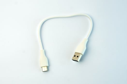 A White USB to Micro USB cable for fast charging and data transfer. Compact and durable, ideal for smartphones, tablets, power banks, and other electronic devices photo