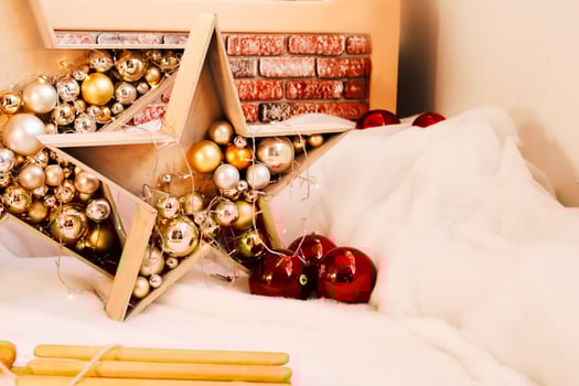 Festive holiday decorations featuring a star filled with ornaments and a cozy winter ambiance photo
