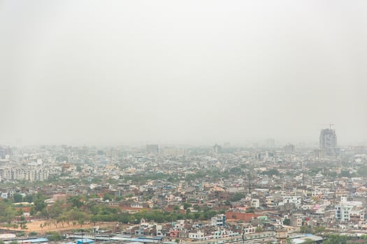 Jaipur cityscape showing air pollution and urban sprawl in India photo