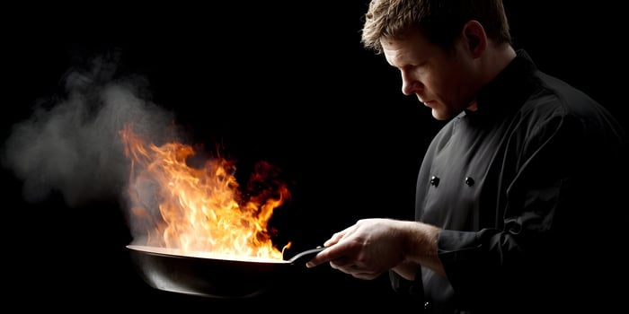 Chef Cooking with Fire Flames in Pan Restaurant Food Culinary photo