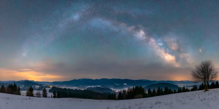 Milky Way Galaxy Over Snowy Mountain Range Winter Night Scene photo
