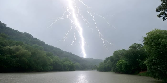 Lightning Strike over River and Green Hills Landscape Photography photo