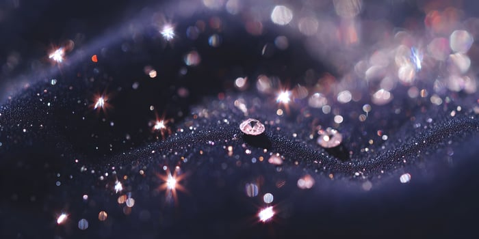 Dark Blue Fabric with Sparkling Rhinestones and Glimmering Lights photo