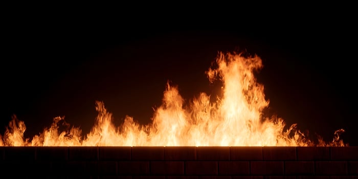 Fire Burning Over Brick Wall Night Scene Intense Flames Background photo
