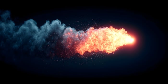 Fiery Explosion with Blue Smoke and Embers Dramatic Fire Blast Illustration photo