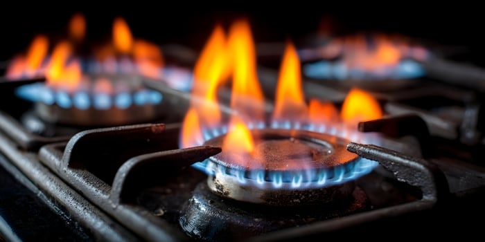 Closeup Gas Stovetop Burners Flames Cooking Kitchen photo