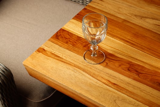 An Elegant Glass Set Beautifully Placed on a Wooden Table Creates a Stunning Display photo