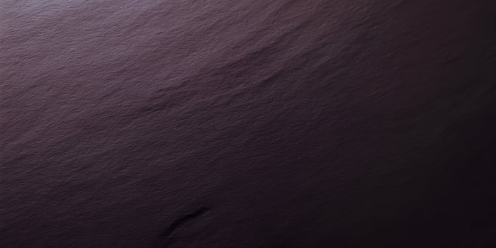 Dark Purple Textured Background Subtle Rough Surface Deep Color Gradient photo