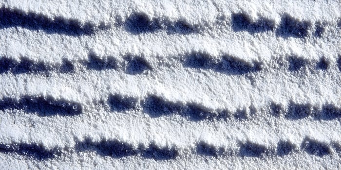 White Sand Texture with Parallel Lines and Shadows photo