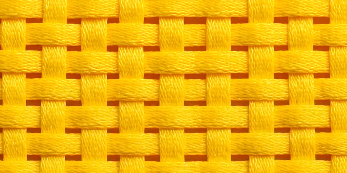 Bright Yellow Woven Fabric Texture Seamless Pattern Background photo