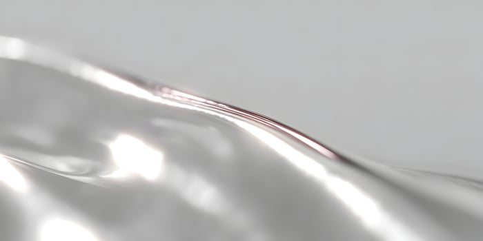 Abstract Silver Liquid Flowing Smooth Surface Background photo