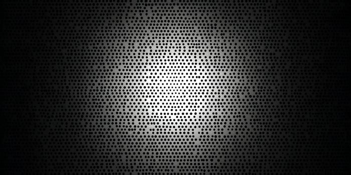 Dark Gray Metal Perforated Plate Background Circles Pattern photo