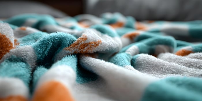 Closeup Soft Teal Orange White Blanket Texture photo