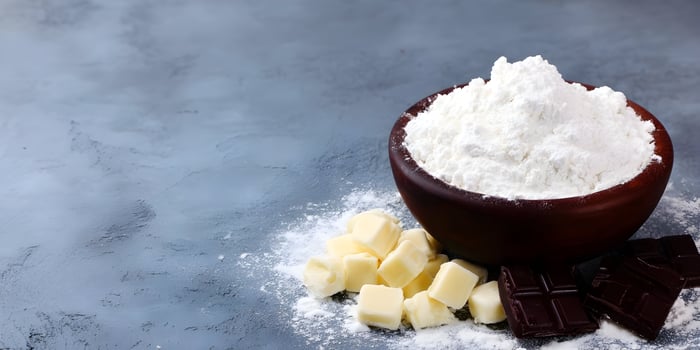 Wooden Bowl of Flour White Chocolate Dark Chocolate Baking Ingredients photo