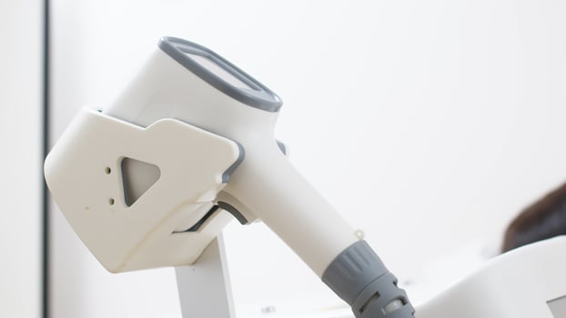 Laser hair removal. Hair removal-depilation. A young woman undergoes a laser hair removal procedure, close-up. Cosmetic clinic. photo
