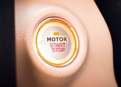 Car start button, MOTOR START STOP switch or Push start with keyless ignition, modern car or electric vehicle concept. photo