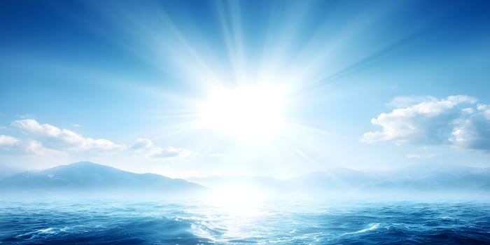 Bright Sun Rays Over Ocean and Mountains Scenic Seascape photo