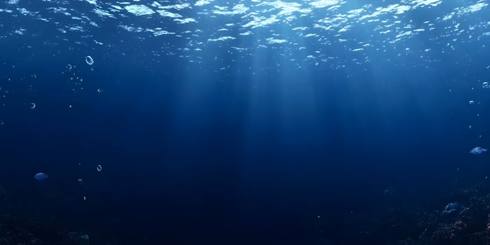 Ocean Underwater Scene Deep Blue Water Sunlight Rays Bubbles Seabed photo