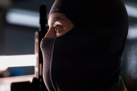 Secret service operative conducing anti terrorism mission in military operations room, employing radar systems to detect and track enemy aircraft and ballistic missiles threatening national security photo