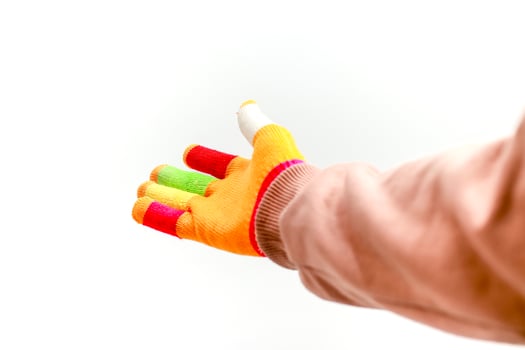 A Vibrant Hand Offering in a Clean, White Space photo