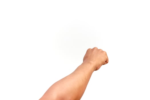 Isolated Raised Fist on White Background photo