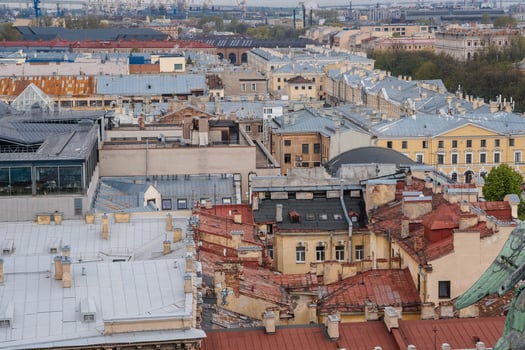 St. Petersburg Rooftops Showcasing Historical Architecture and Modern City Views During a Cloudy Day photo