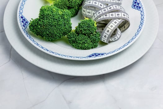 healthy eating and weight loss. Plate of broccoli. photo