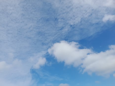 Beautiful white clouds on deep blue sky background. Skyscape on Lombok Island, Indonesia photo