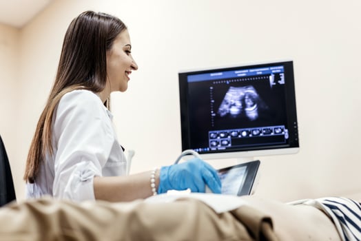 Close-up ultrasound of a pregnant woman. Concept prenatal diagnostics and maternal care photo