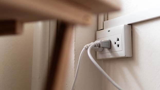 Electrical outlet power supply indoor setting home environment close-up view everyday life photo