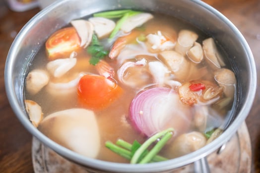 Delicious spicy soup recipe local kitchen food cozy atmosphere close-up culinary adventure photo