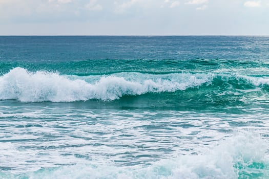 Waves crashing serene beach coastal area nature scene tranquil environment landscape view ocean concept photo