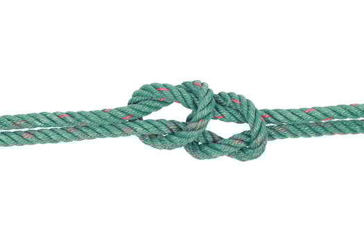 Rope knot symbol isolated on white photo