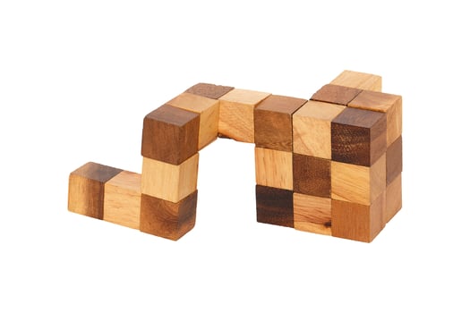 puzzle wooden cube isolated on white photo